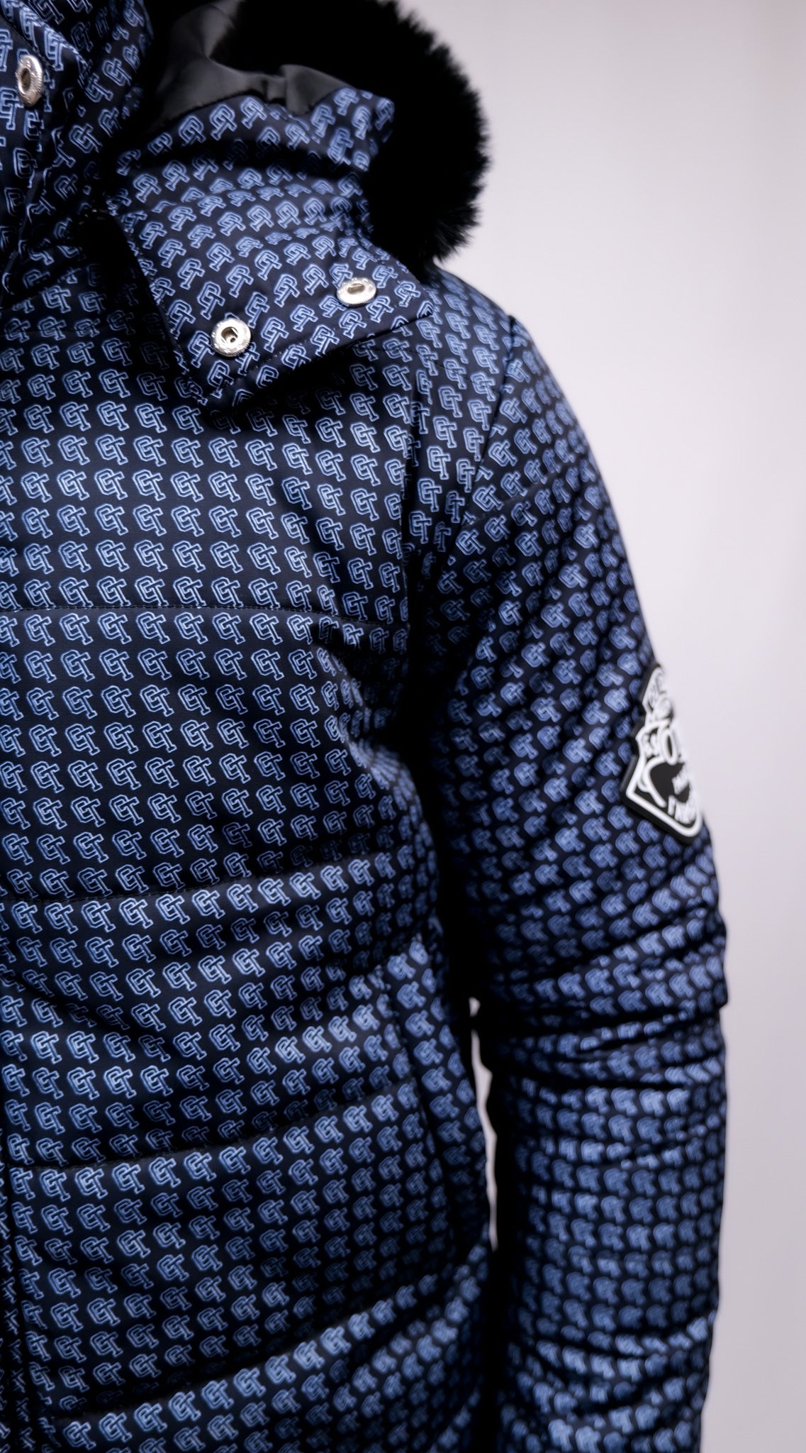 BLACK AND BLUE OT EMBLEM PATTERN JACKET